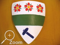 Reiterschild mit englobiertem Balken-Blumen und Hammermotiv