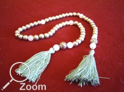 Paternoster aus Silber-und Bergkristallperlen mit Seidenzaddeln